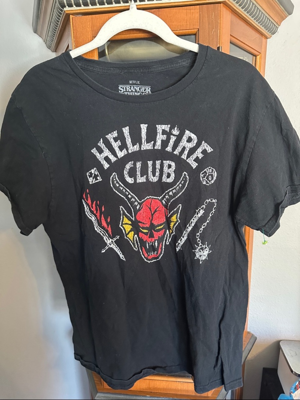 Netflix Stranger Things Black Hellfire Club Graphic Tee with Red and Yellow Art